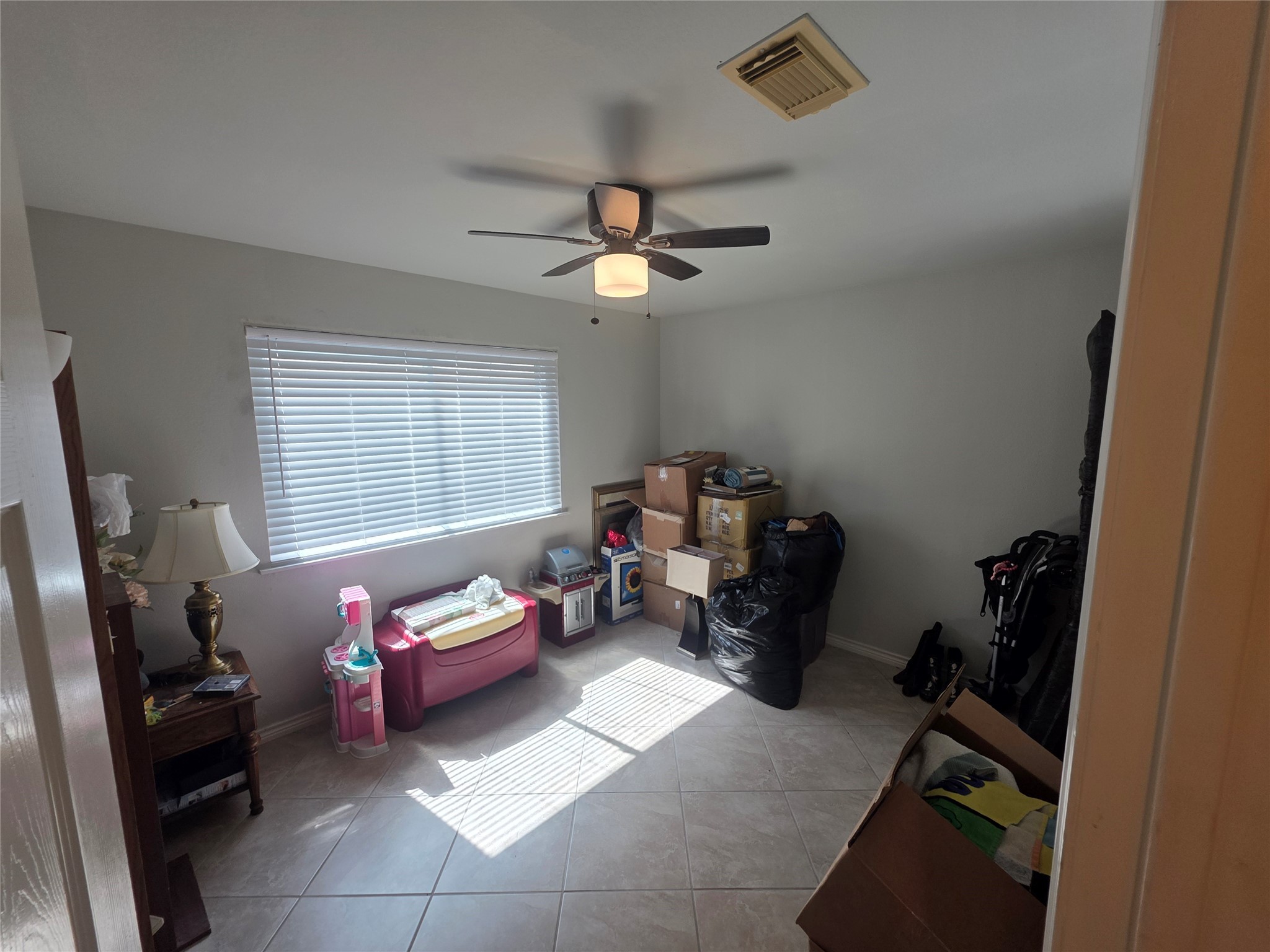 12531 La Rochelle Drive Houston, TX 77015 - Photo 6 of 15 a bedroom with furniture and a window