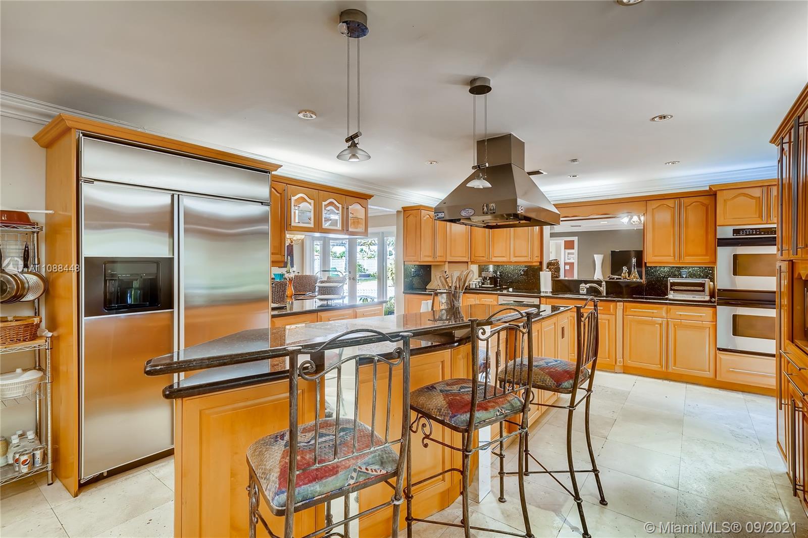 1851 Southwest 126th Court Miami, FL 33175 - Photo 19 of 27 a view of a kitchen with kitchen island granite countertop lots of counter top space