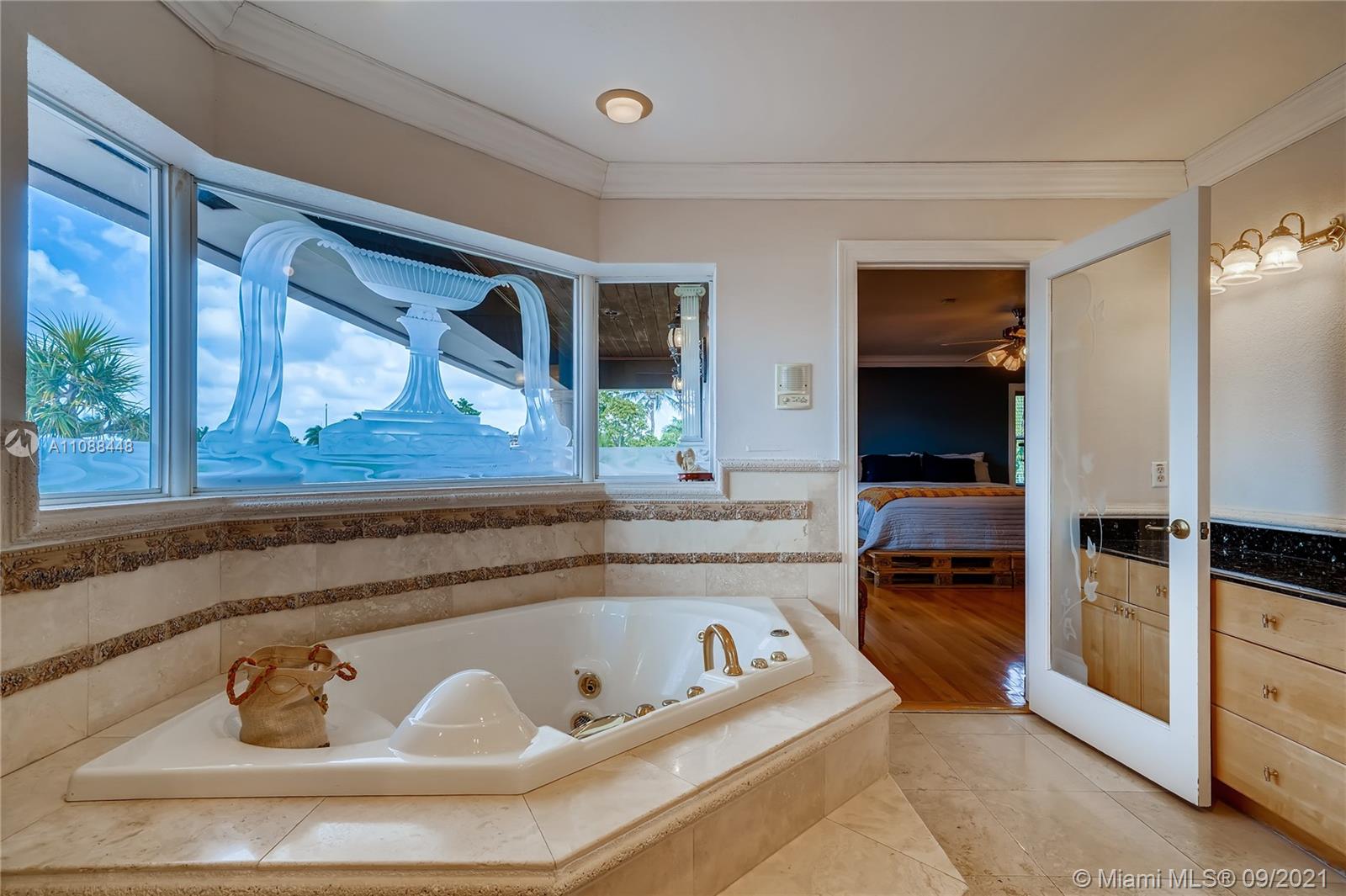 1851 Southwest 126th Court Miami, FL 33175 - Photo 27 of 27 a kitchen with a bathtub and a sink