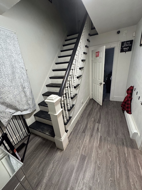 99 Clover Street Worcester, MA 01603 - Photo 8 of 8 a view of entryway and hall with wooden floor