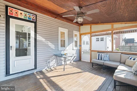 a outdoor space with patio the couches and a dining table with the balcony view