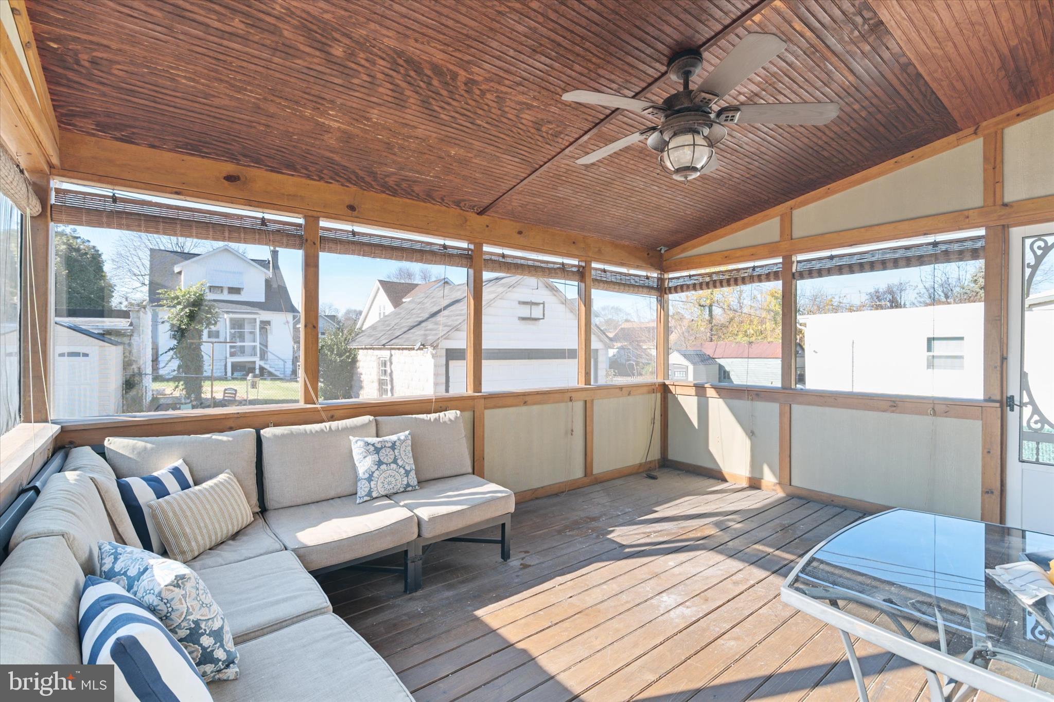 3827 Echodale Avenue Baltimore, MD 21206 - Photo 30 of 36 a living room with furniture and a large window