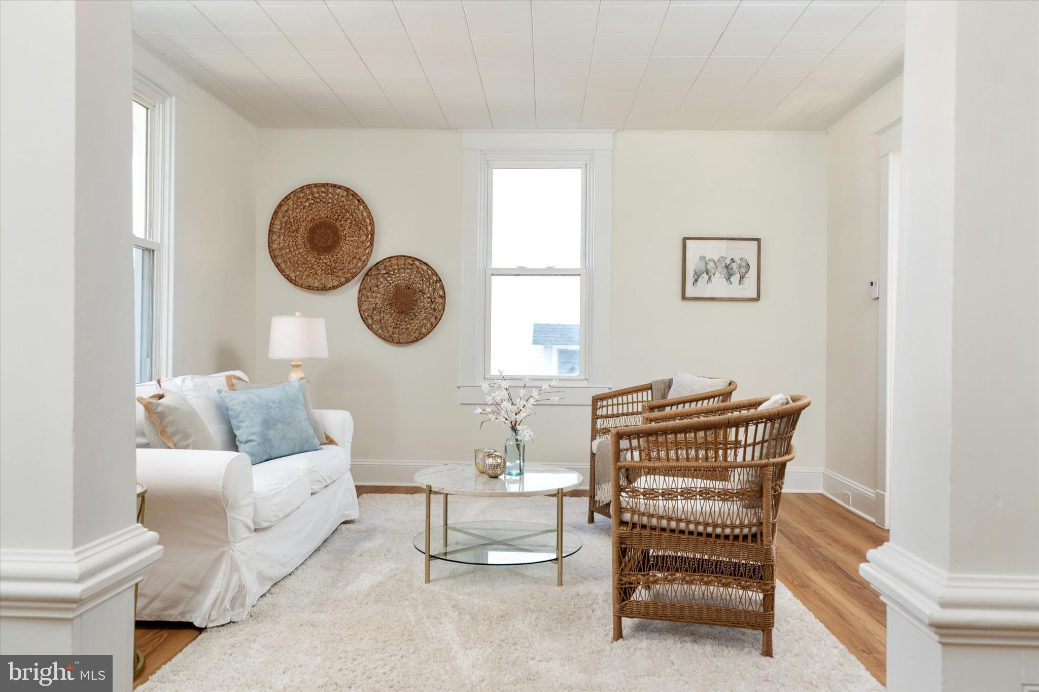3827 Echodale Avenue Baltimore, MD 21206 - Photo 5 of 36 a living room with furniture and a window
