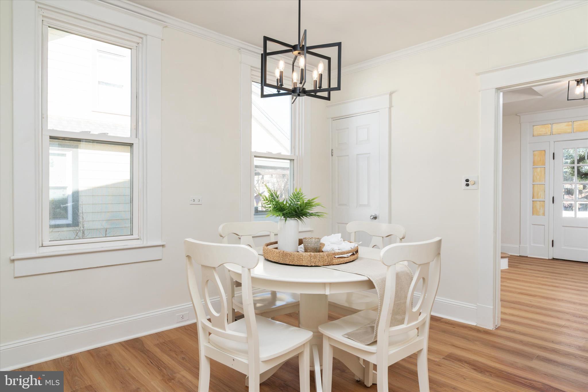 3827 Echodale Avenue Baltimore, MD 21206 - Photo 10 of 36 a dining room with furniture and window