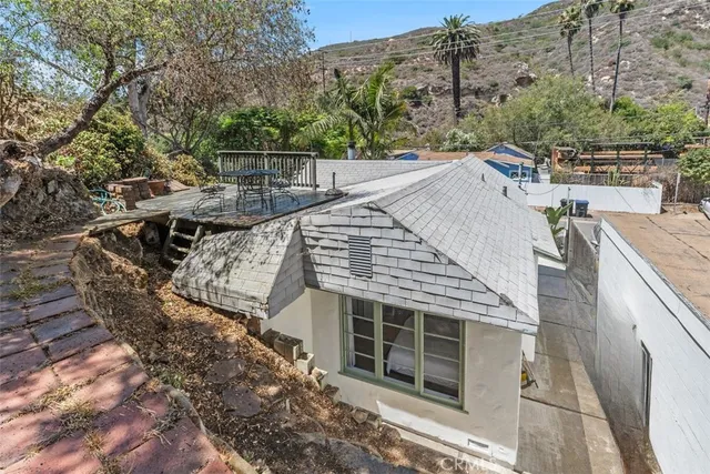 a view of a couches on the roof deck