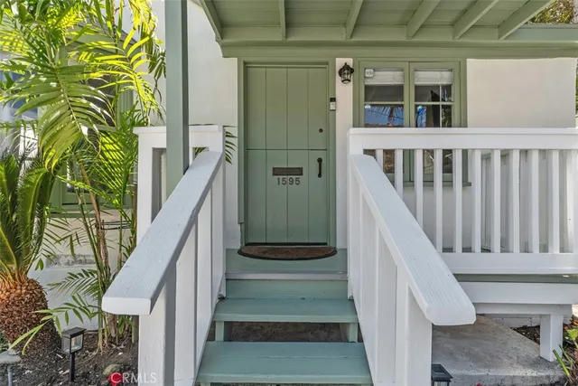 a view of stairs with wooden floor and stairs