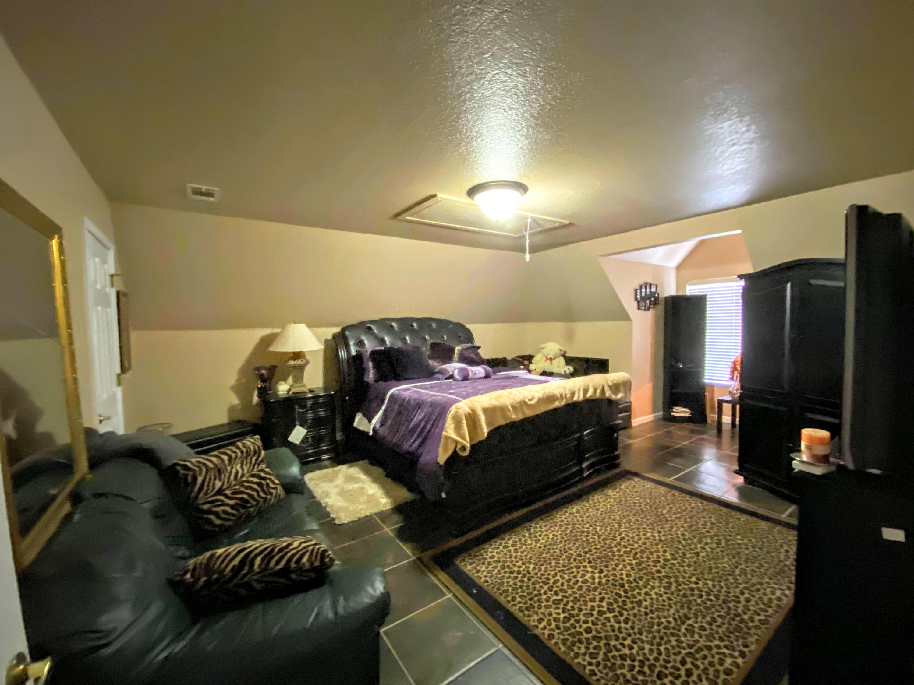 100 Sioux Circle Crestview, FL 32536 - Photo 16 of 36 a bed room with a bed and a television