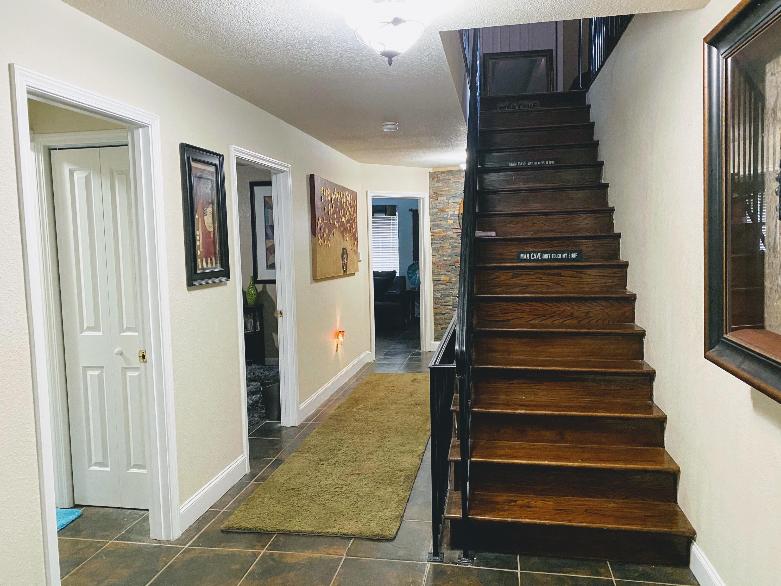 100 Sioux Circle Crestview, FL 32536 - Photo 17 of 36 a view of entryway with wooden floor and windows