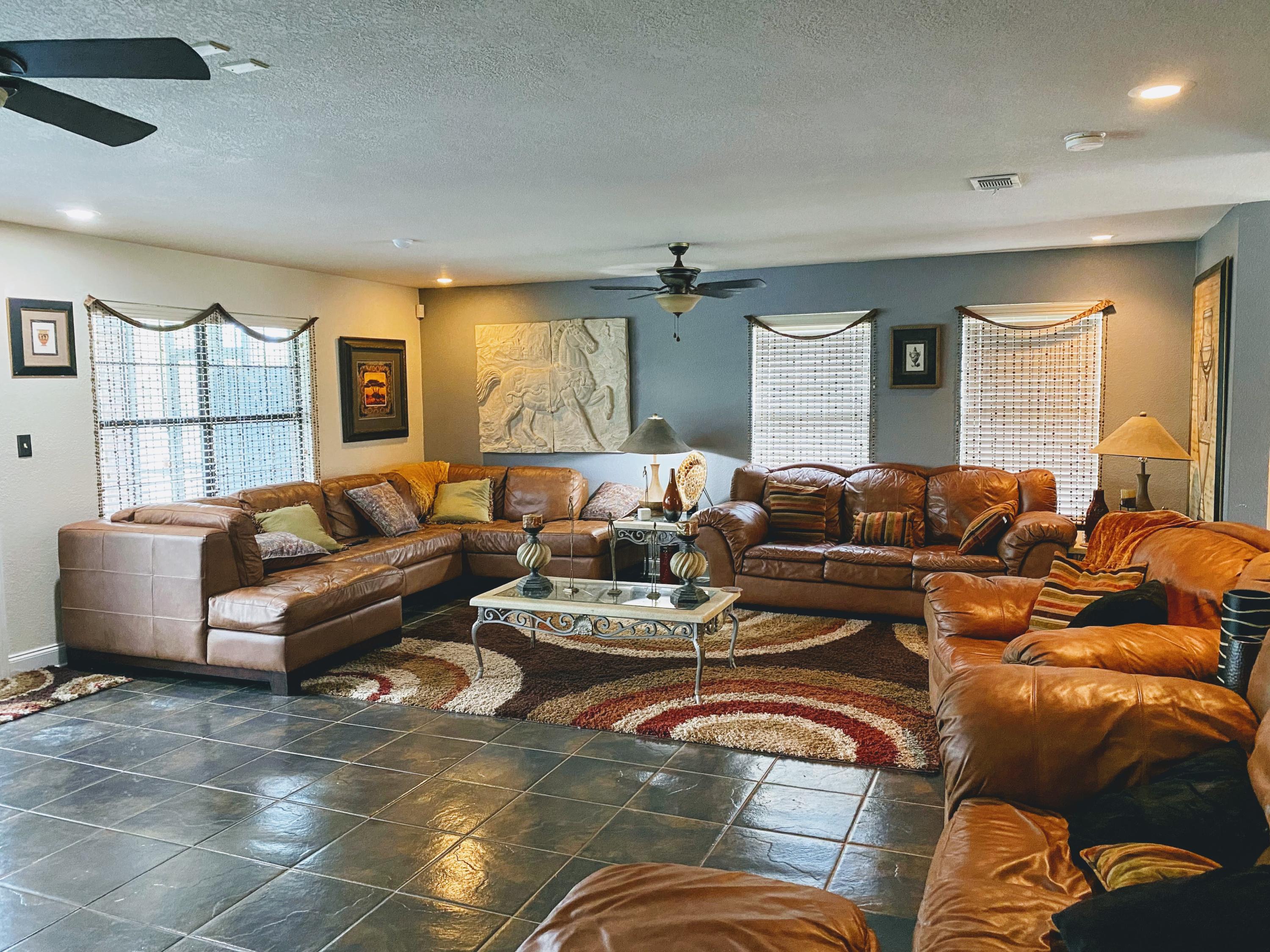 100 Sioux Circle Crestview, FL 32536 - Photo 2 of 36 a living room with furniture and a large window