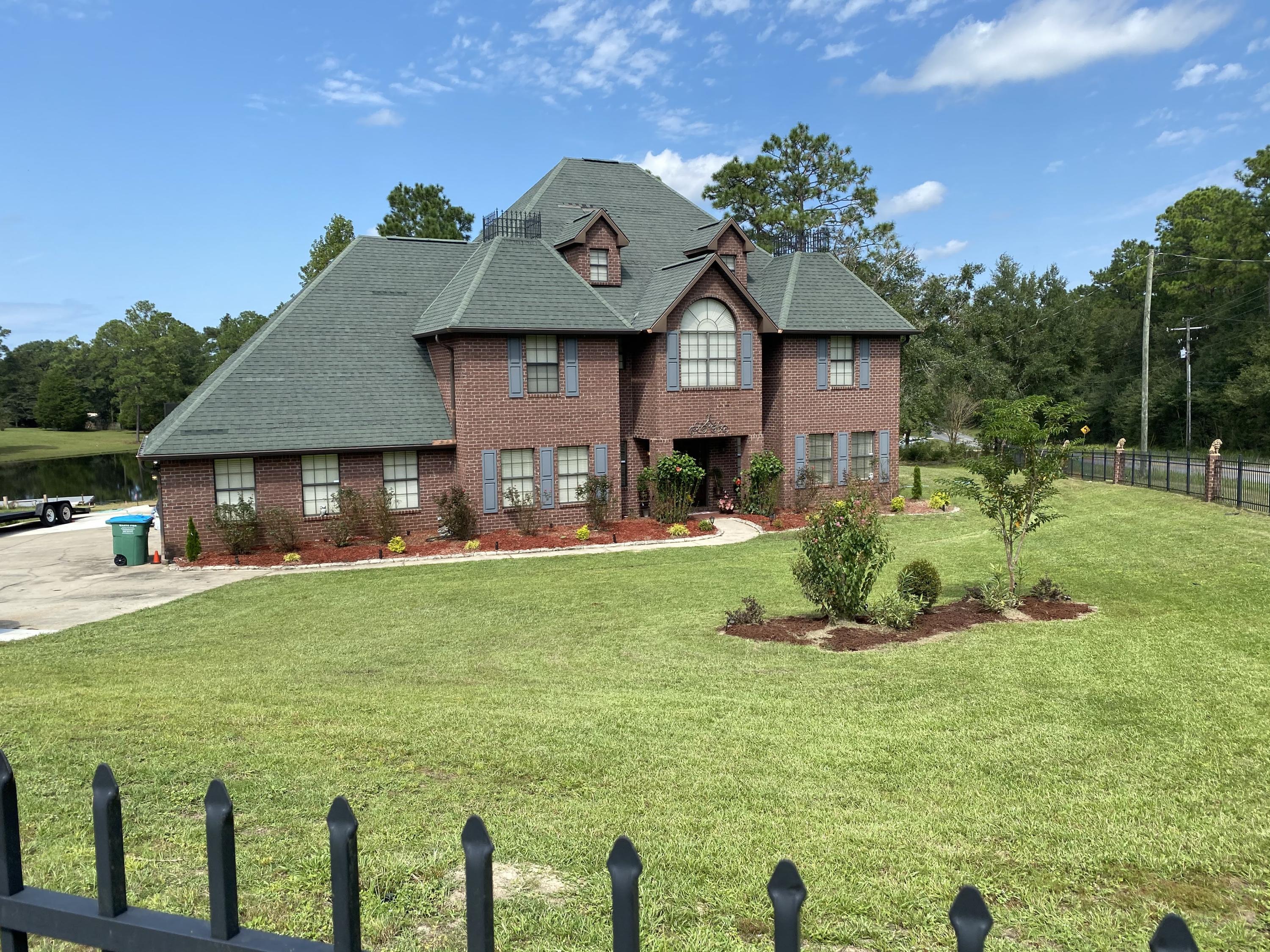 100 Sioux Circle Crestview, FL 32536 - Photo 35 of 36 a front view of a house with a yard