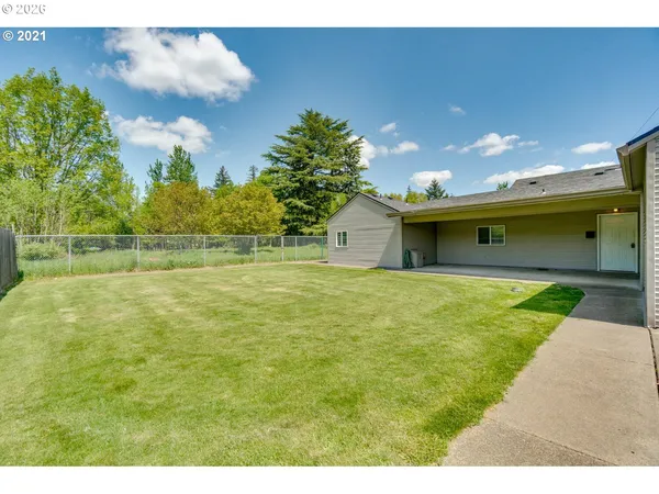 a view of a room with wooden walls