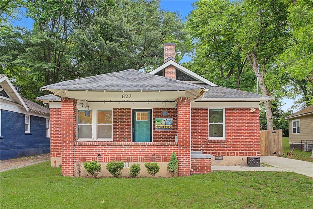 827 Elbert Street Southwest Atlanta, GA 30310 - Photo 29 of 33 a front view of a house with a garden