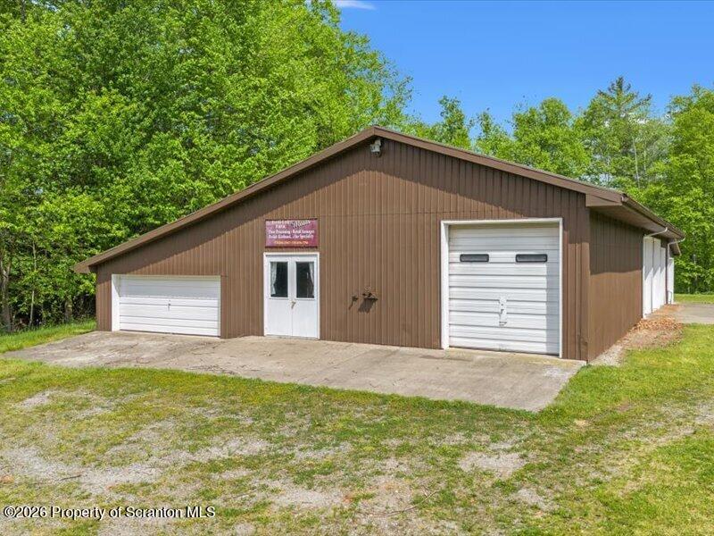 9-17 Vago Road Tunkhannock, PA 18657 - Photo 6 of 57 a house view with a outdoor space