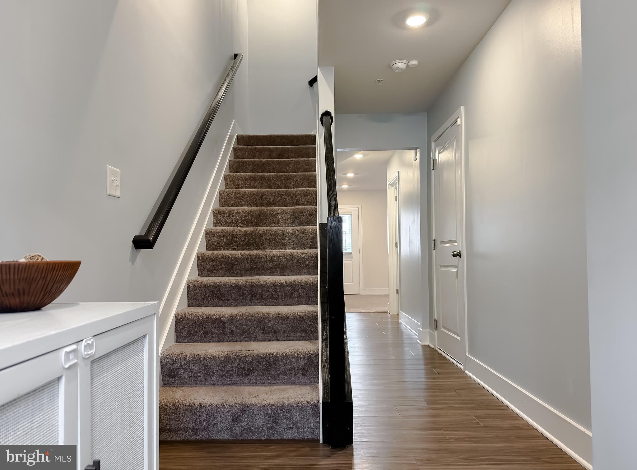 23658 Crosswinds Way California, MD 20619 - Photo 8 of 54 Upgraded Stained Railings w/Wrought
Iron Balusters