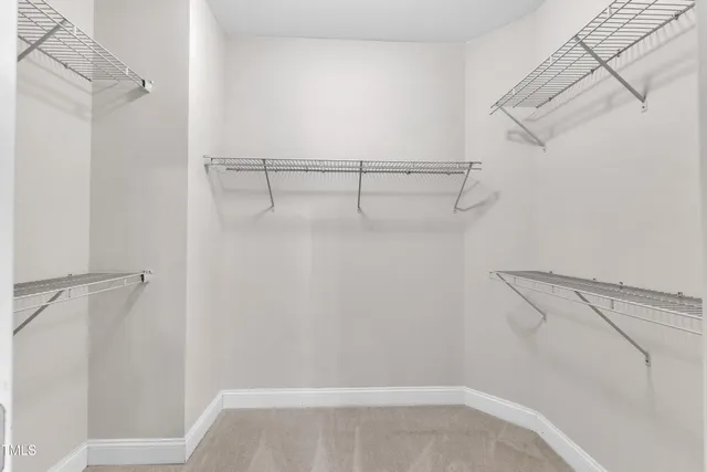 a view of small space with racks on the wall