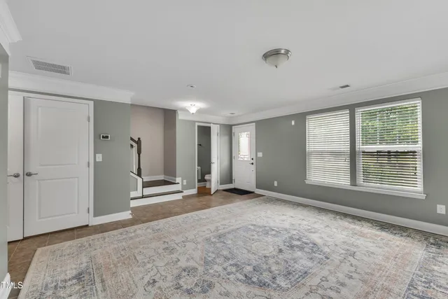a view of a livingroom with shelves