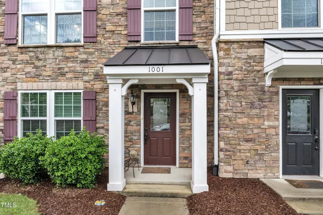 a front view of a house with a door