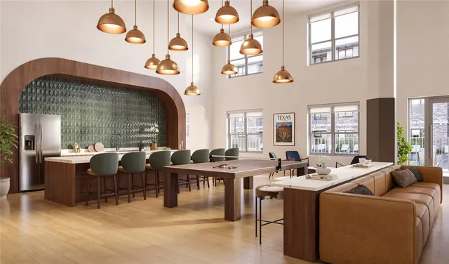 a living room with lots of furniture and window