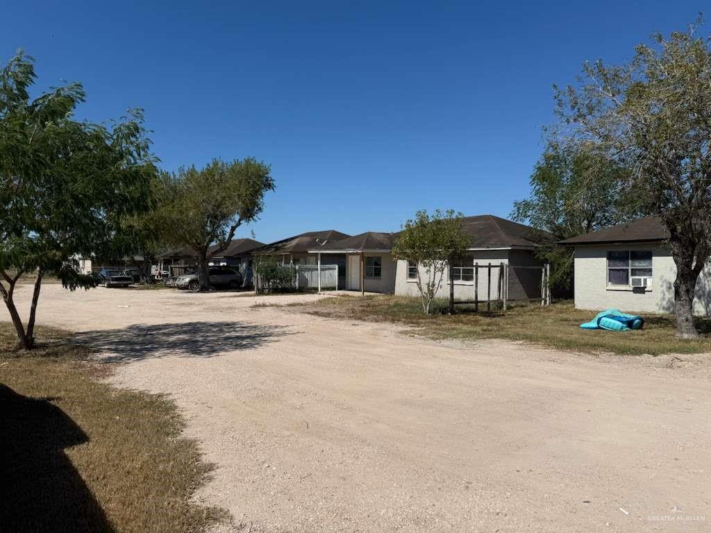 0 Lott Road Donna, TX 78537 - Photo 2 of 15 a front view of a house with a yard
