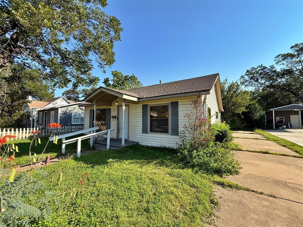 607 La Clede Street Bellmead, TX 76705 - Photo 2 of 7 Bungalow featuring roof with shingles