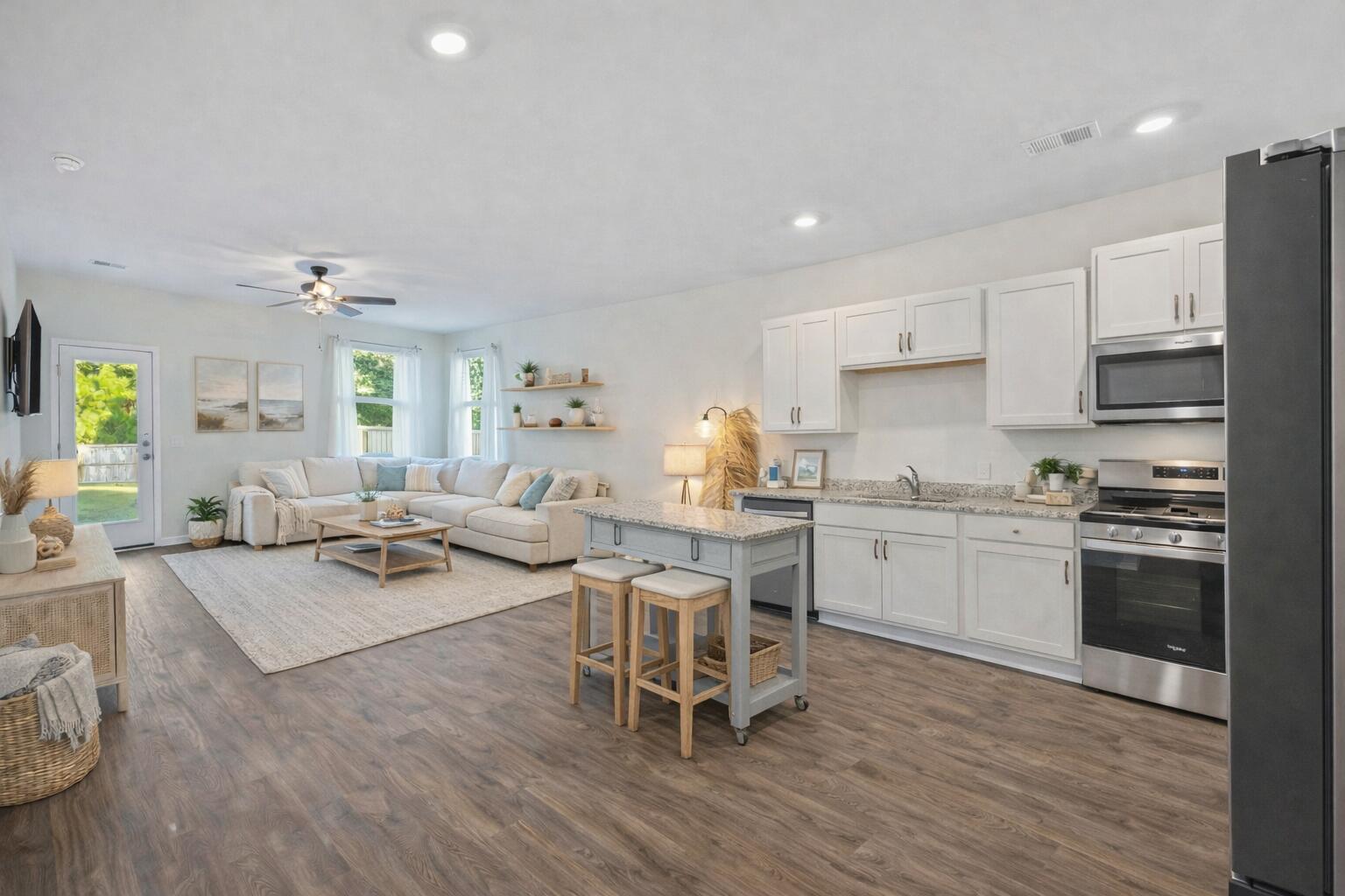 digitally staged kitchen and living room