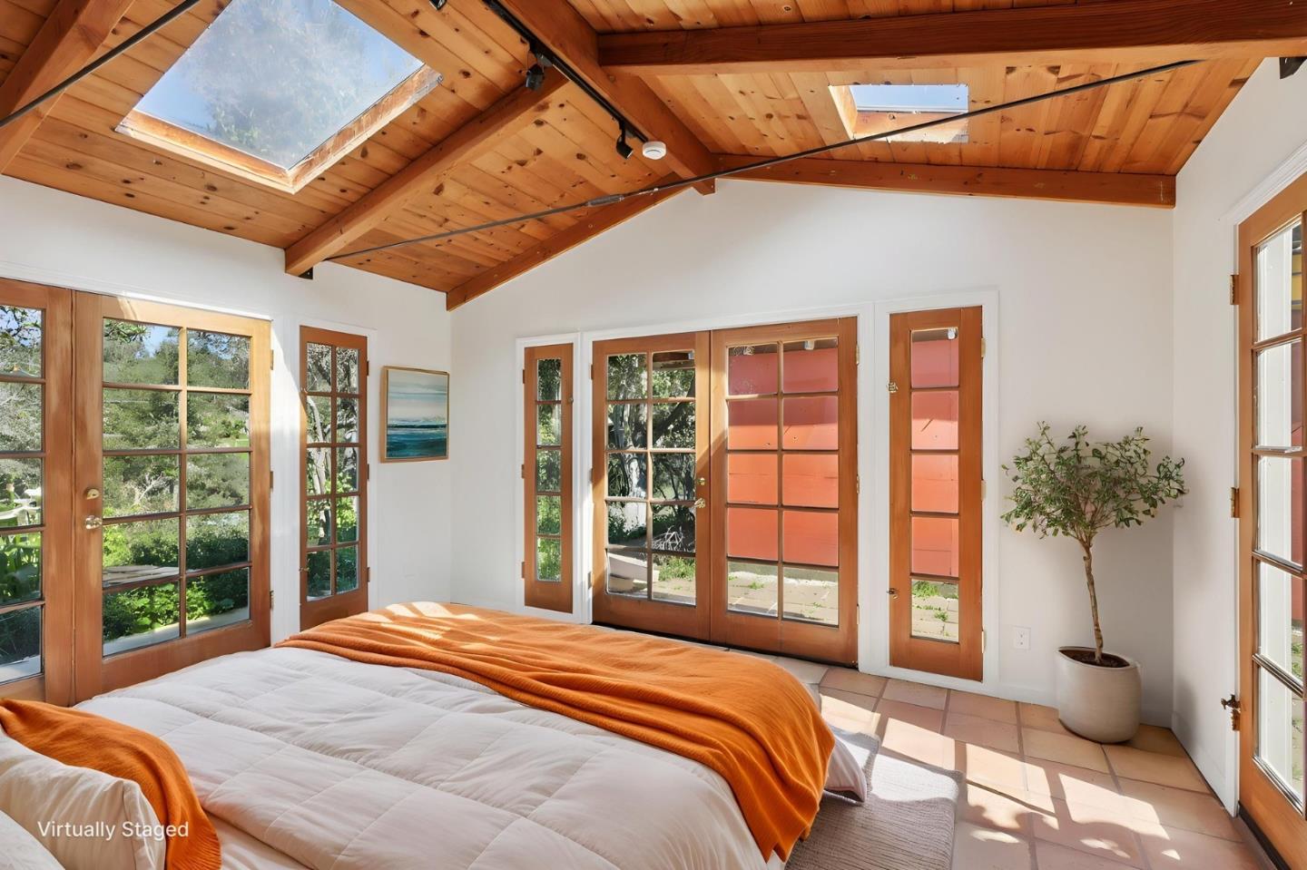 122 Strawberry Road Watsonville, CA 95076 - Photo 24 of 57 a bedroom with a large bed and a large window