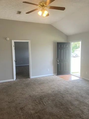 a view of a lake from a yard