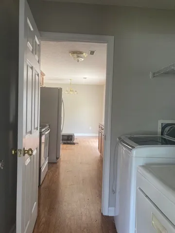 a view of a storage & utility room with a sink