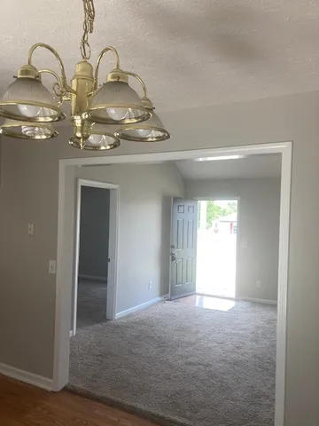 a view of a chandelier in a room