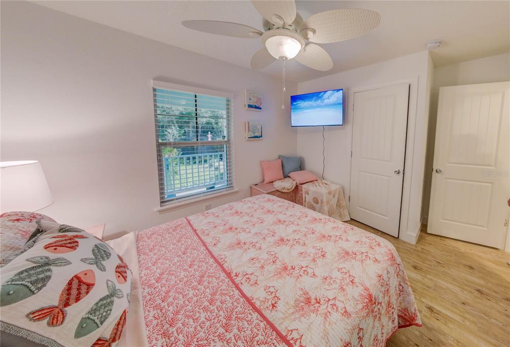 27 Mala Compra Road Palm Coast, FL 32137 - Photo 25 of 57 a bedroom with a bed and a window