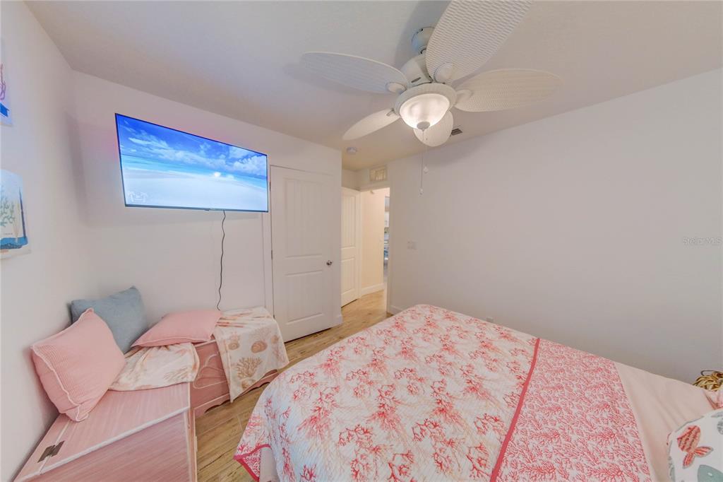 27 Mala Compra Road Palm Coast, FL 32137 - Photo 26 of 57 a bedroom with a bed and dresser