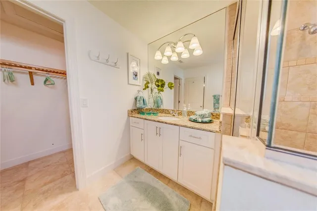 a view of a livingroom with furniture and a window