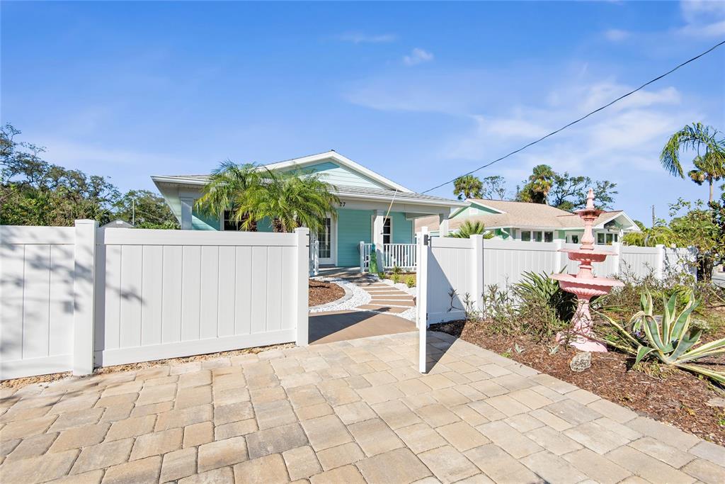 27 Mala Compra Road Palm Coast, FL 32137 - Photo 55 of 57 a view of a house with backyard and sitting area