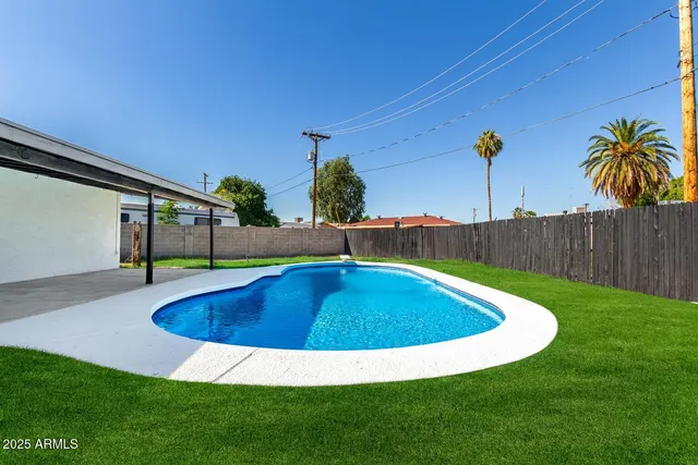 a view of outdoor space yard swimming pool and patio