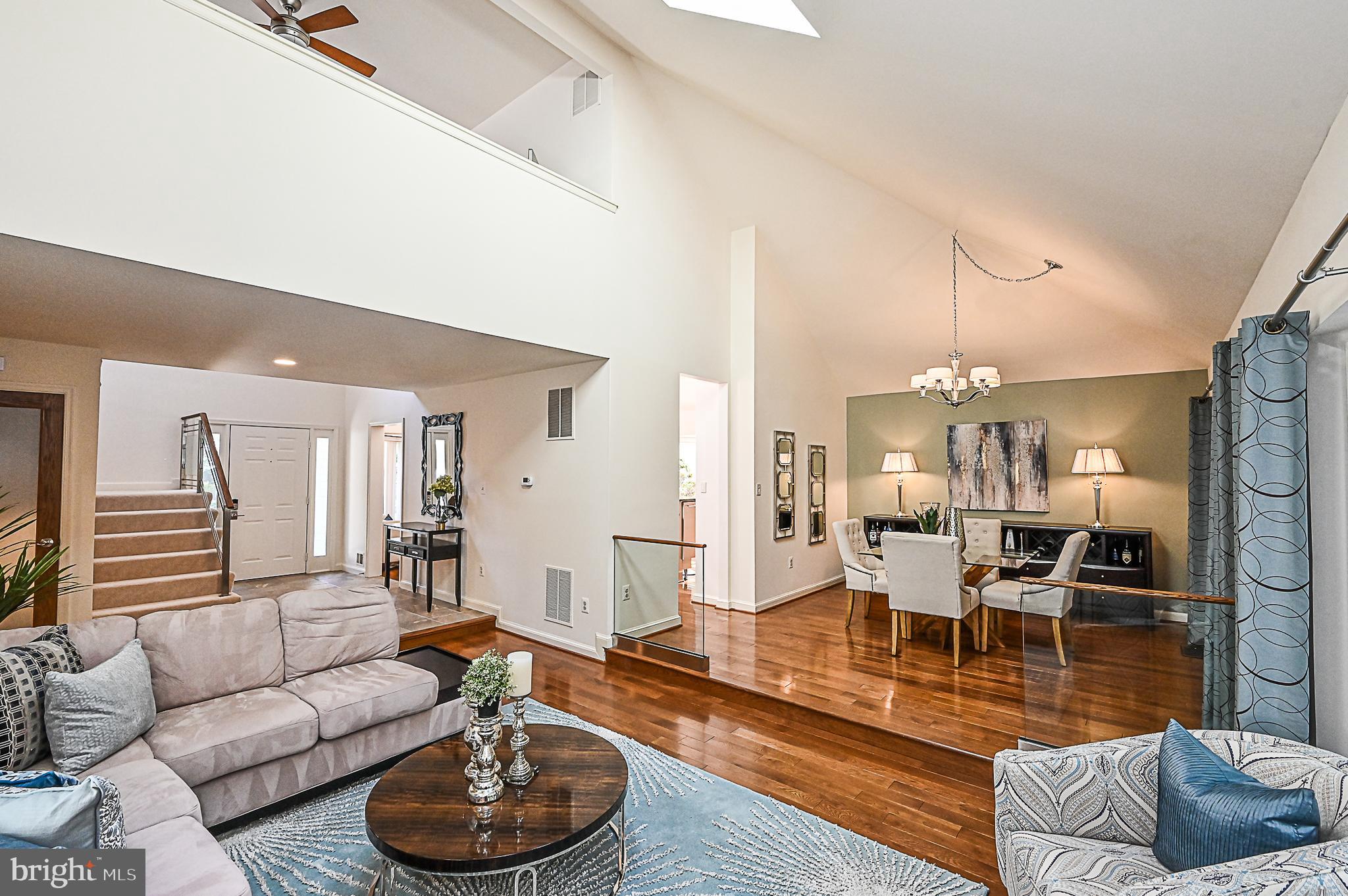 1581 Regatta Lane Reston, VA 20194 - Photo 4 of 38 Living Room to Dining Room