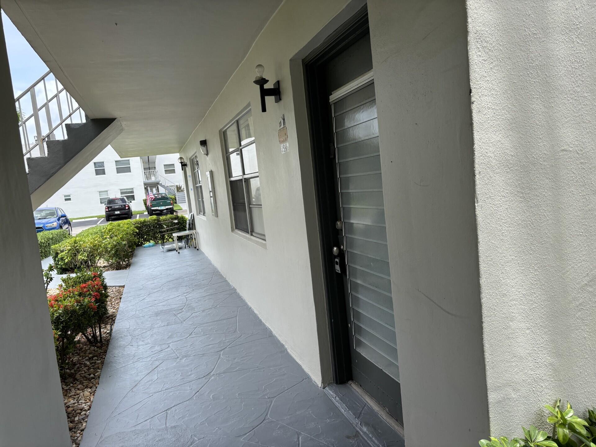 359 Normandy Lane Delray Beach, FL 33484 - Photo 17 of 27 Front Door