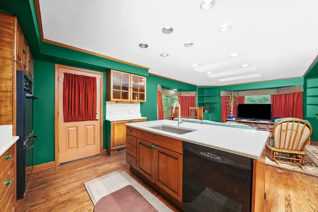a kitchen that has a cabinets and a stove
