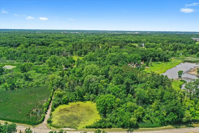 a view of a garden from a balcony