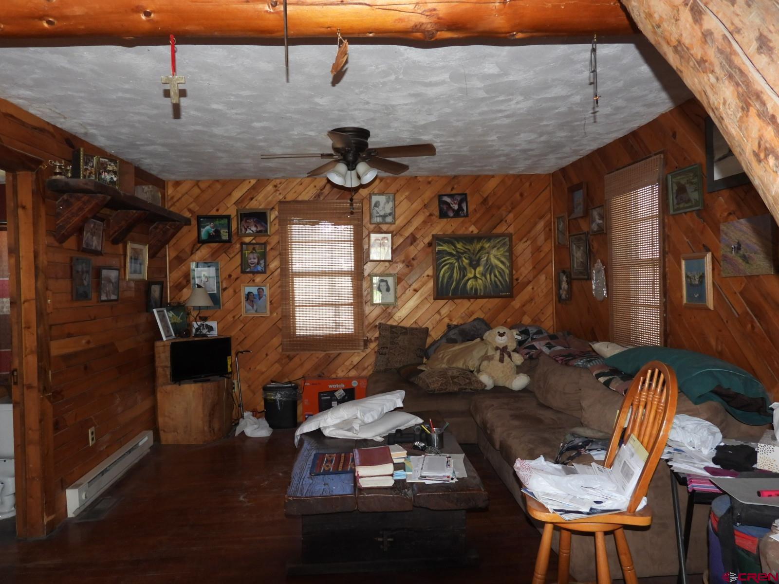 21764 R Road Cedaredge, CO 81413 - Photo 5 of 27 a living room with furniture