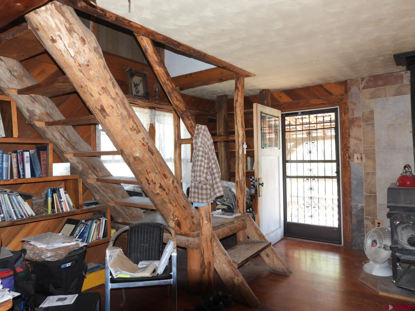 21764 R Road Cedaredge, CO 81413 - Photo 6 of 27 a view of an entryway with wooden floor