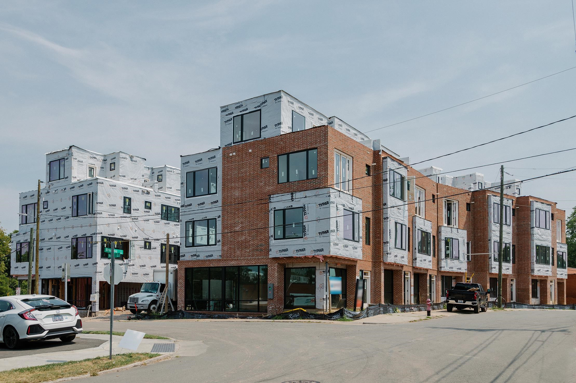 1001 Hundley Durham, NC 27701 - Photo 2 of 29 a city street lined with buildings and a cars parked on the street