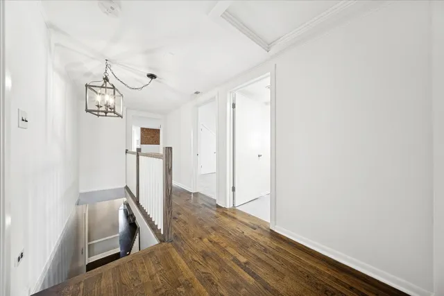 a view of a hallway with workspace