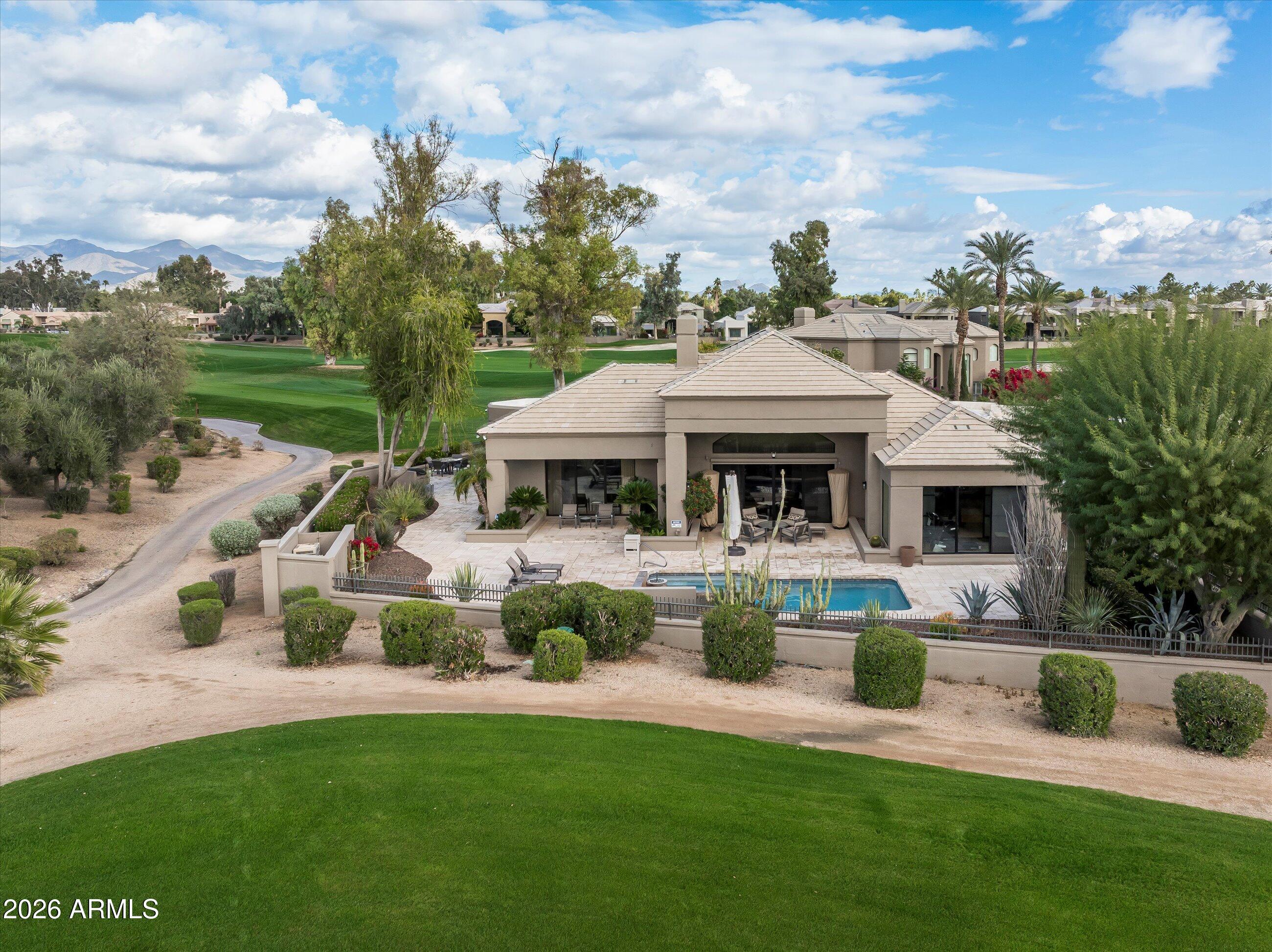 7878 East Gainey Ranch Road, Unit 65 Scottsdale, AZ 85258 - Photo 20 of 73 Exterior View from Golf Course