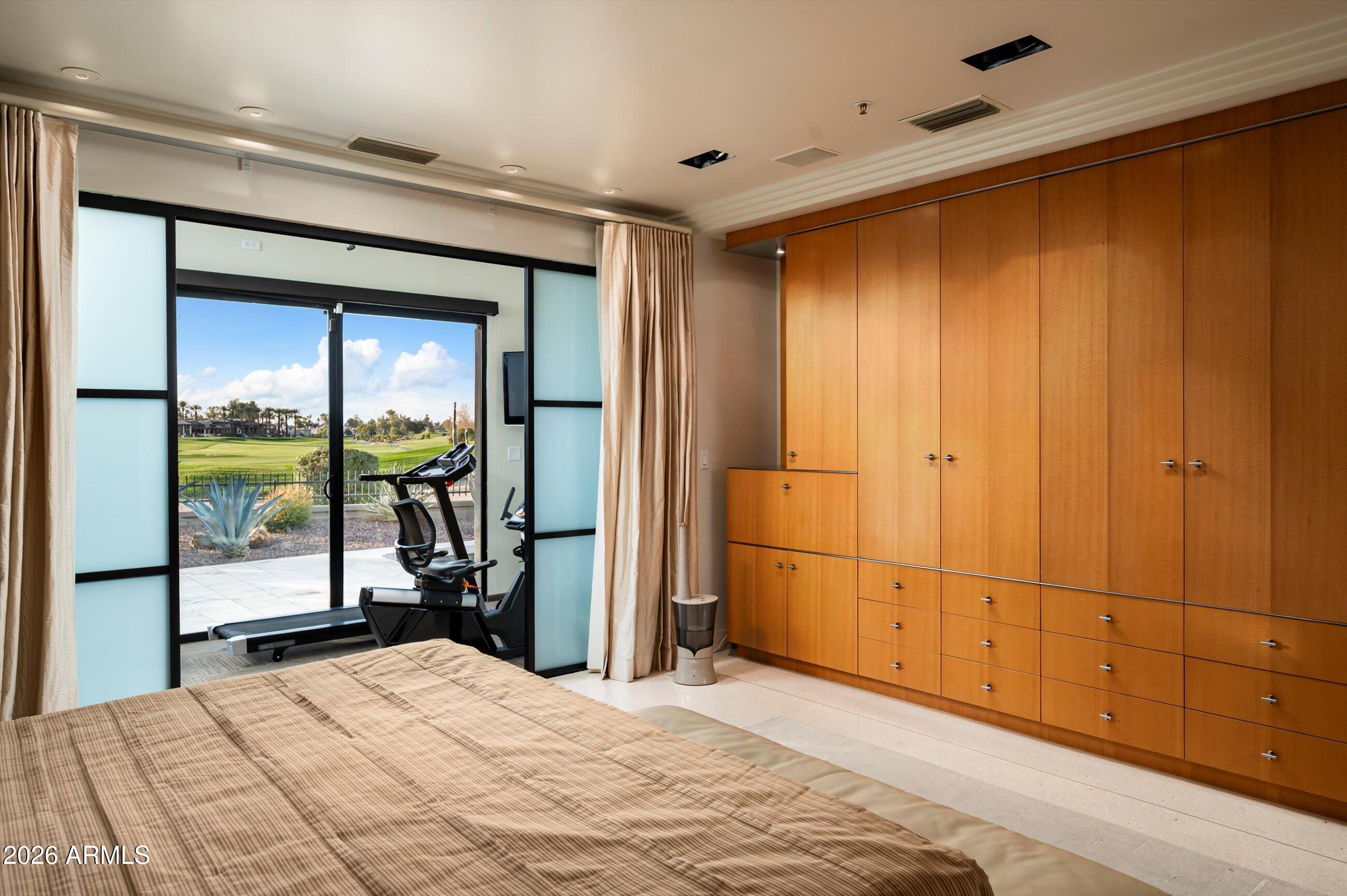 7878 East Gainey Ranch Road, Unit 65 Scottsdale, AZ 85258 - Photo 29 of 73 Primary Bedroom to Exercise Room