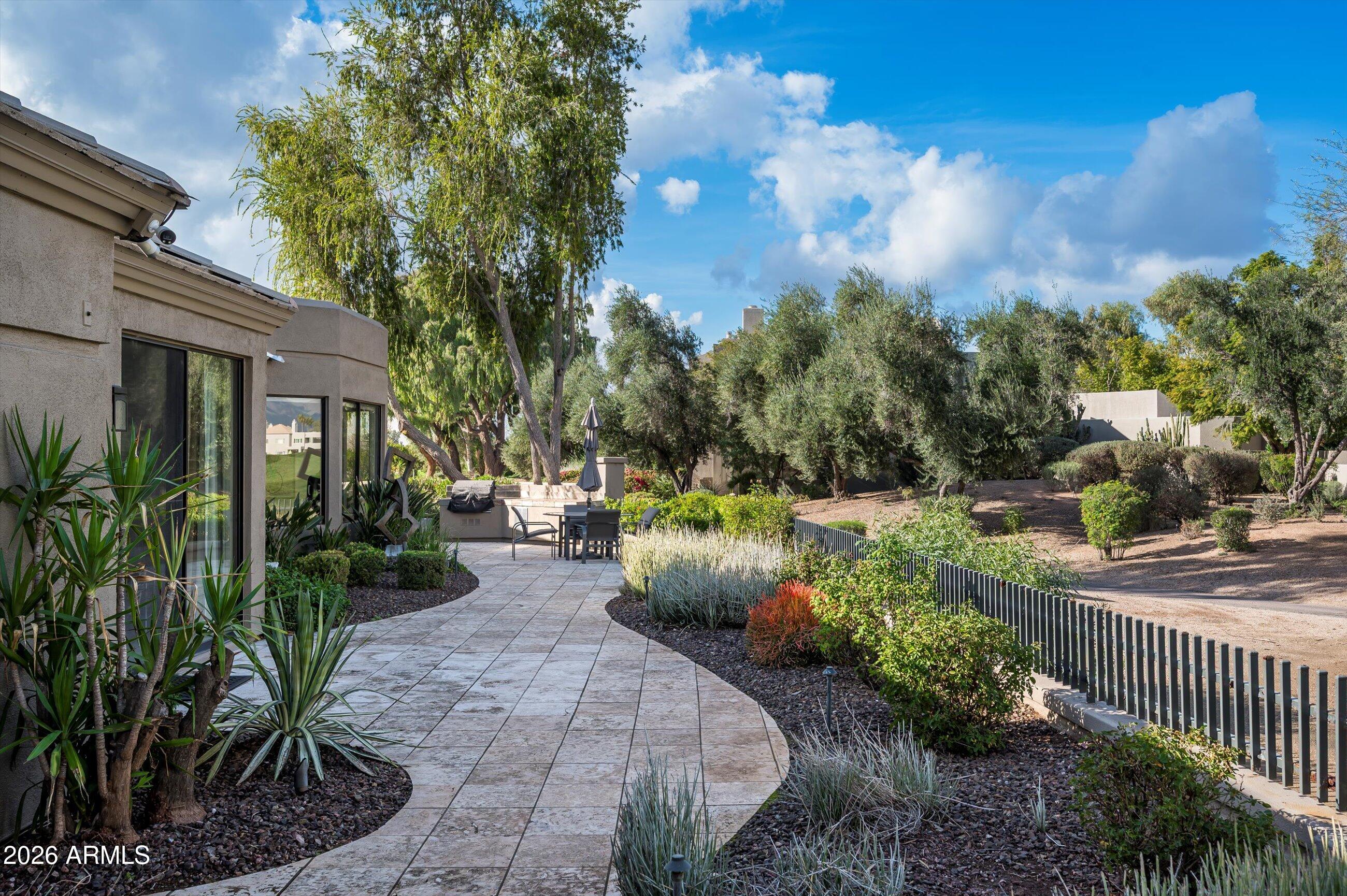 7878 East Gainey Ranch Road, Unit 65 Scottsdale, AZ 85258 - Photo 47 of 73 Large, expansive backyard area