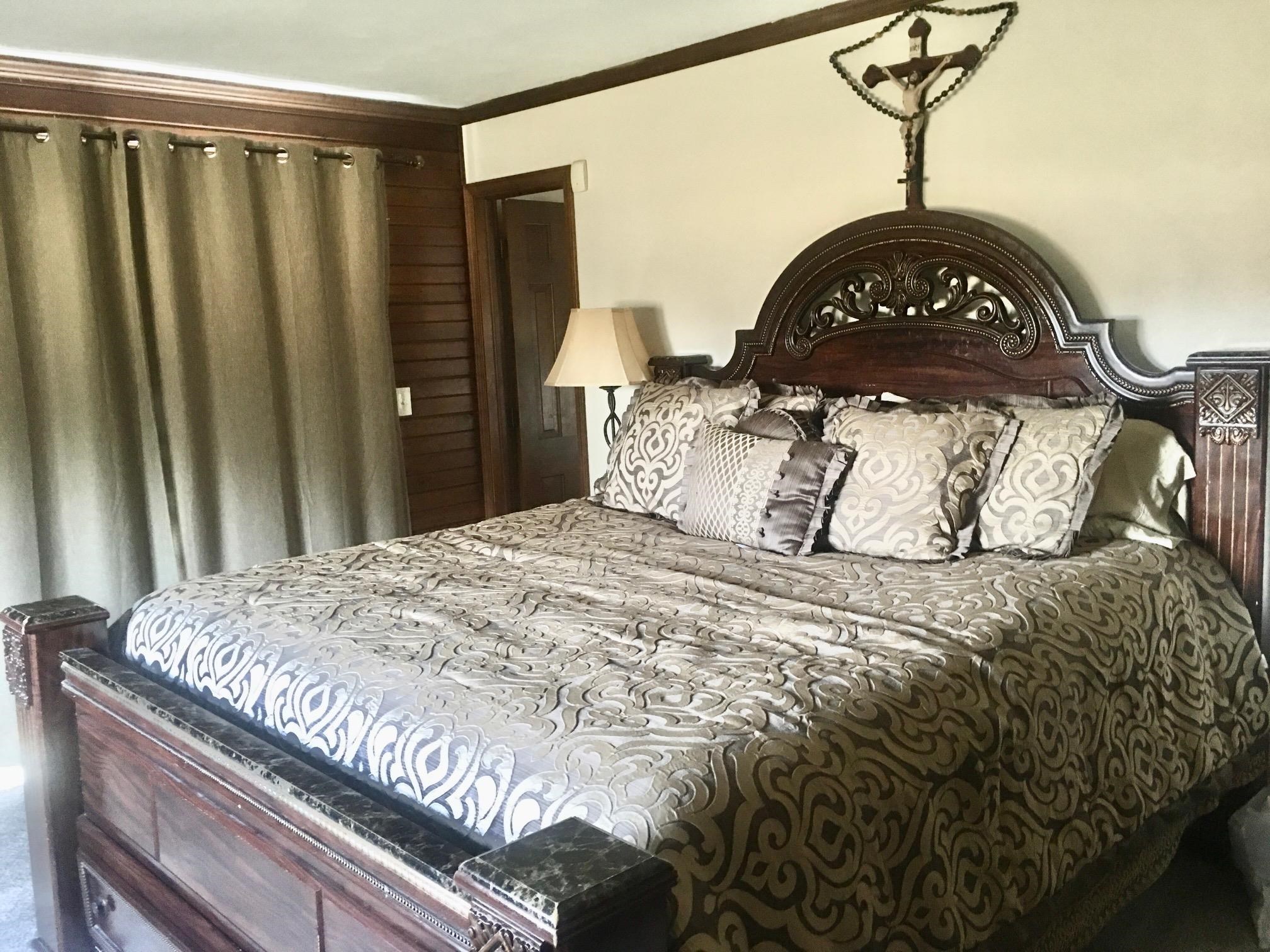 256 Spring Creek Road Rockford, IL 61114 - Photo 13 of 29 a bedroom with a bed and a table