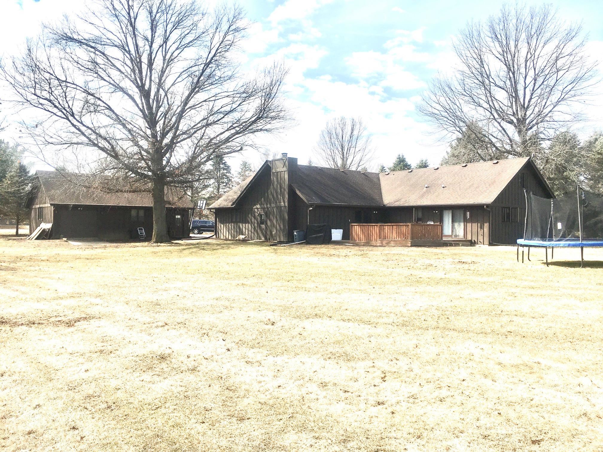 256 Spring Creek Road Rockford, IL 61114 - Photo 25 of 29 a swimming pool with outdoor seating and yard