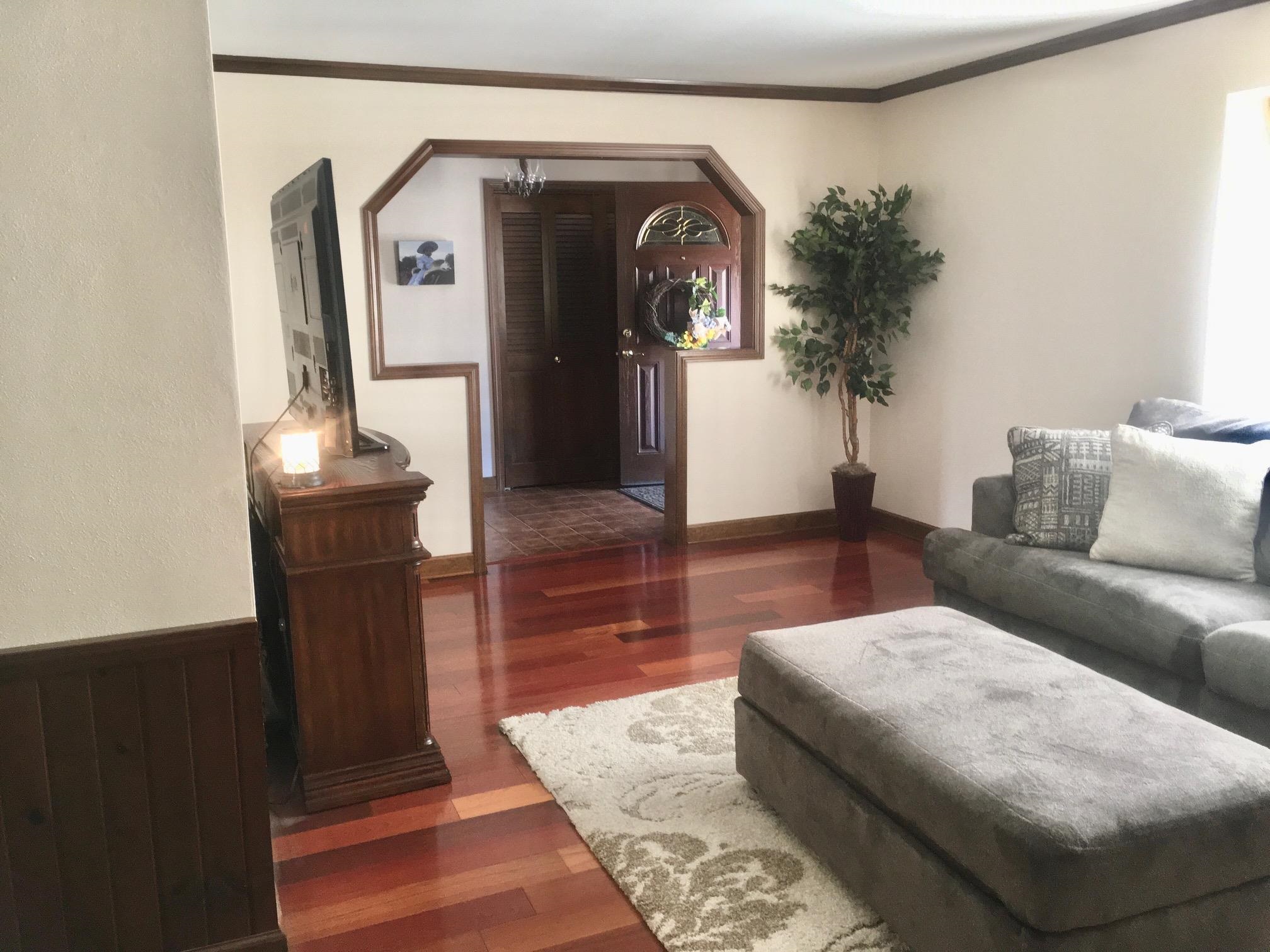 256 Spring Creek Road Rockford, IL 61114 - Photo 10 of 29 a living room with furniture and a fireplace