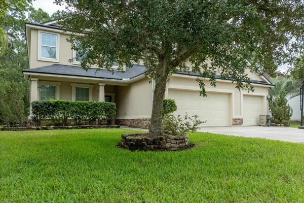 a house view with a garden space