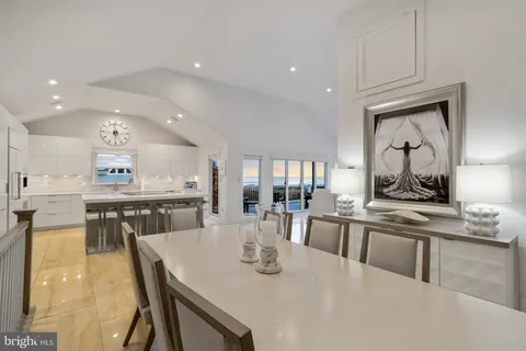 a view of a balcony with furniture